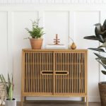 scandinavian-vintage-wood-cabinet-with-houseplants-2022-12-16-00-46-06-utc.jpg
